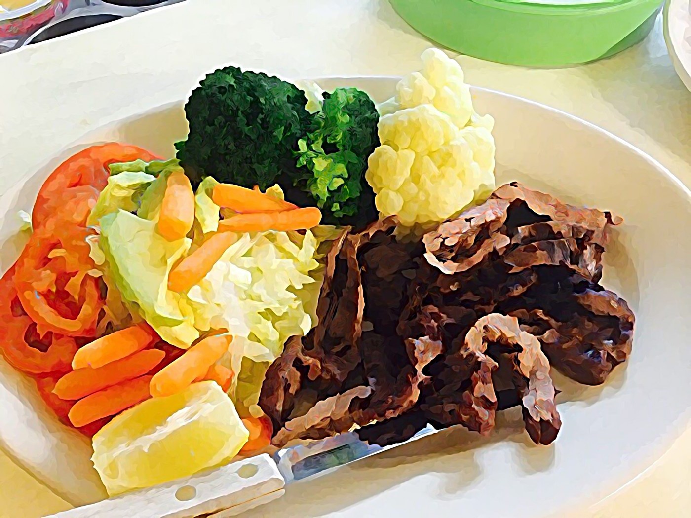 A beef and vegetable plate featured by Trigo’s
